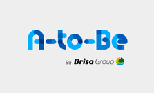 Logo for A-to-Be by Brisa Grupo, featuring a blue stylized wordmark and a small green leaf on a light gray background.